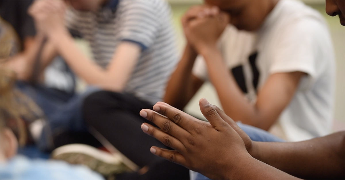 Photo of hands together in prayer