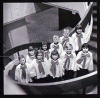 Children on the stairs of the chapel