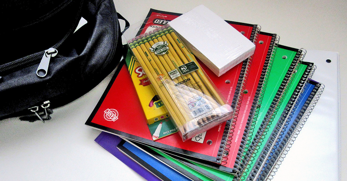 Photo of pencils, notebooks, index cards and a backpack.