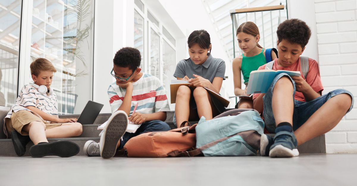 Photo of a group of children studying.